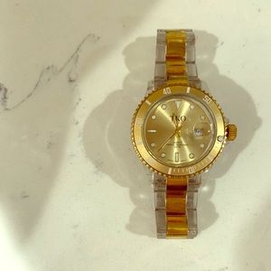 TKO Quartz Water Resistant Clear & Gold Lucite.